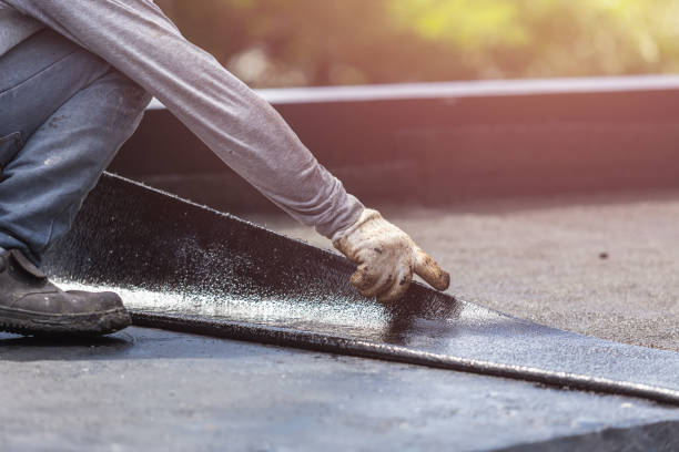 Professional Exterior Waterproofing technician working in Norwich, NY